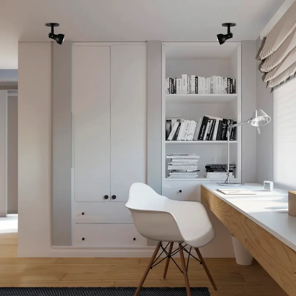 <img src="escritorio-moderno-desenho-trabalho-casa.webp" alt="Imagem de um escritório moderno com móveis brancos, uma mesa de madeira clara, uma cadeira branca, prateleiras com livros em tons de preto e branco, iluminação indireta e uma janela com cortinas claras, ideal para um espaço de estudo ou trabalho.">